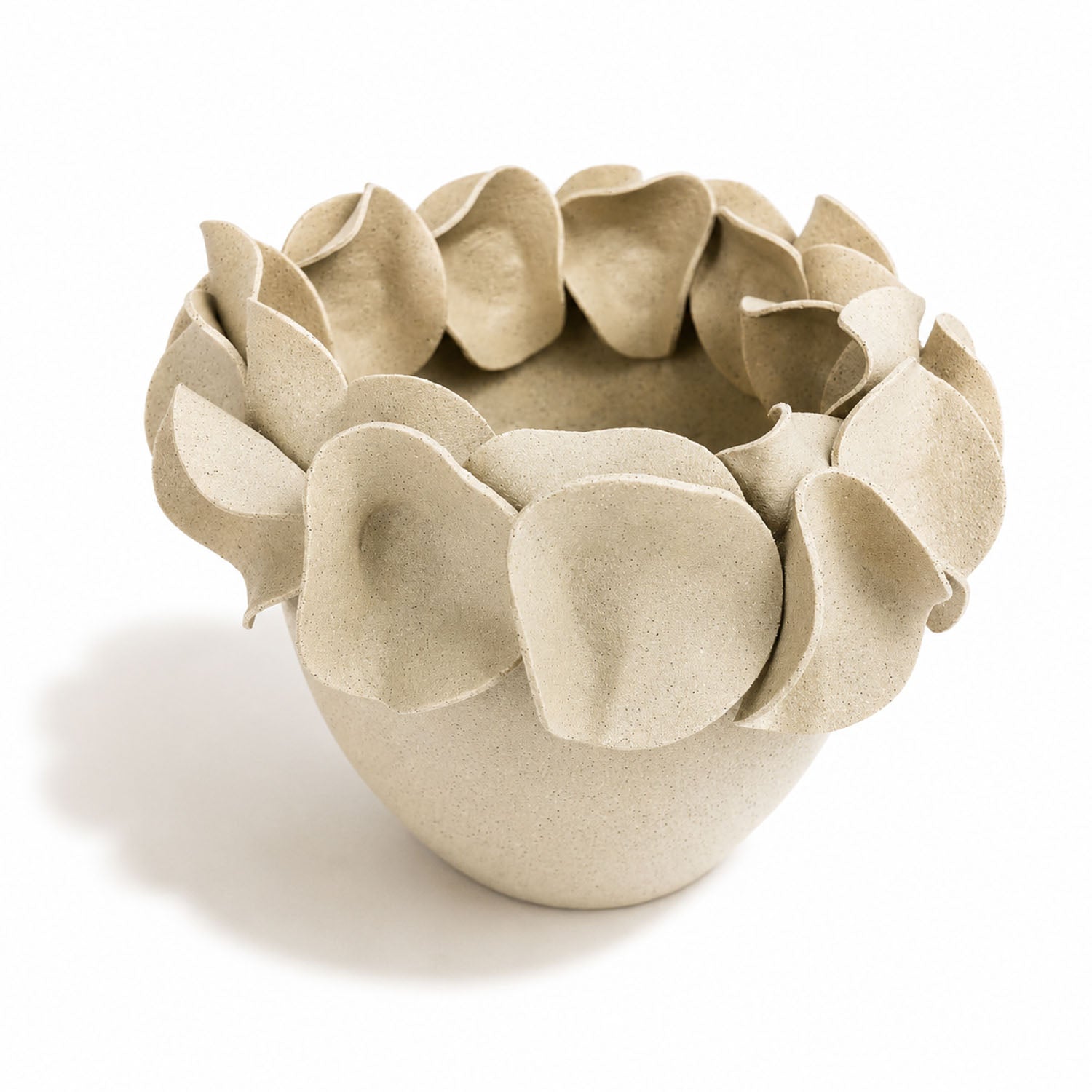 A light natural white speckled ceramic planter with a wide rim made of overlapping petal-like flaps, by Polly Barton Ceramics.