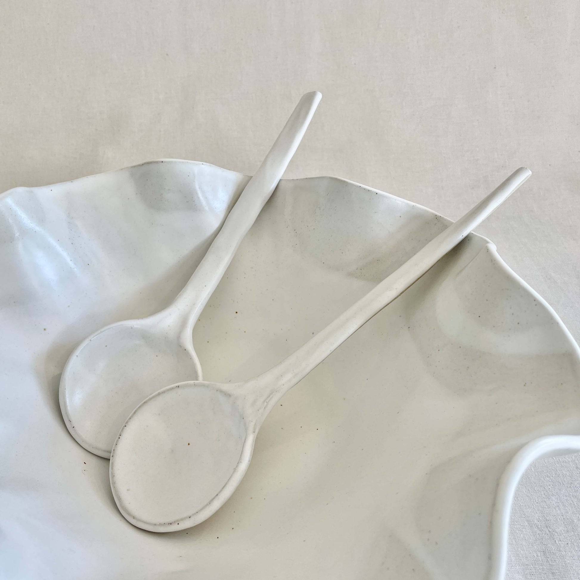 White Ceramic Serving Spoons & Large Wave Bowl