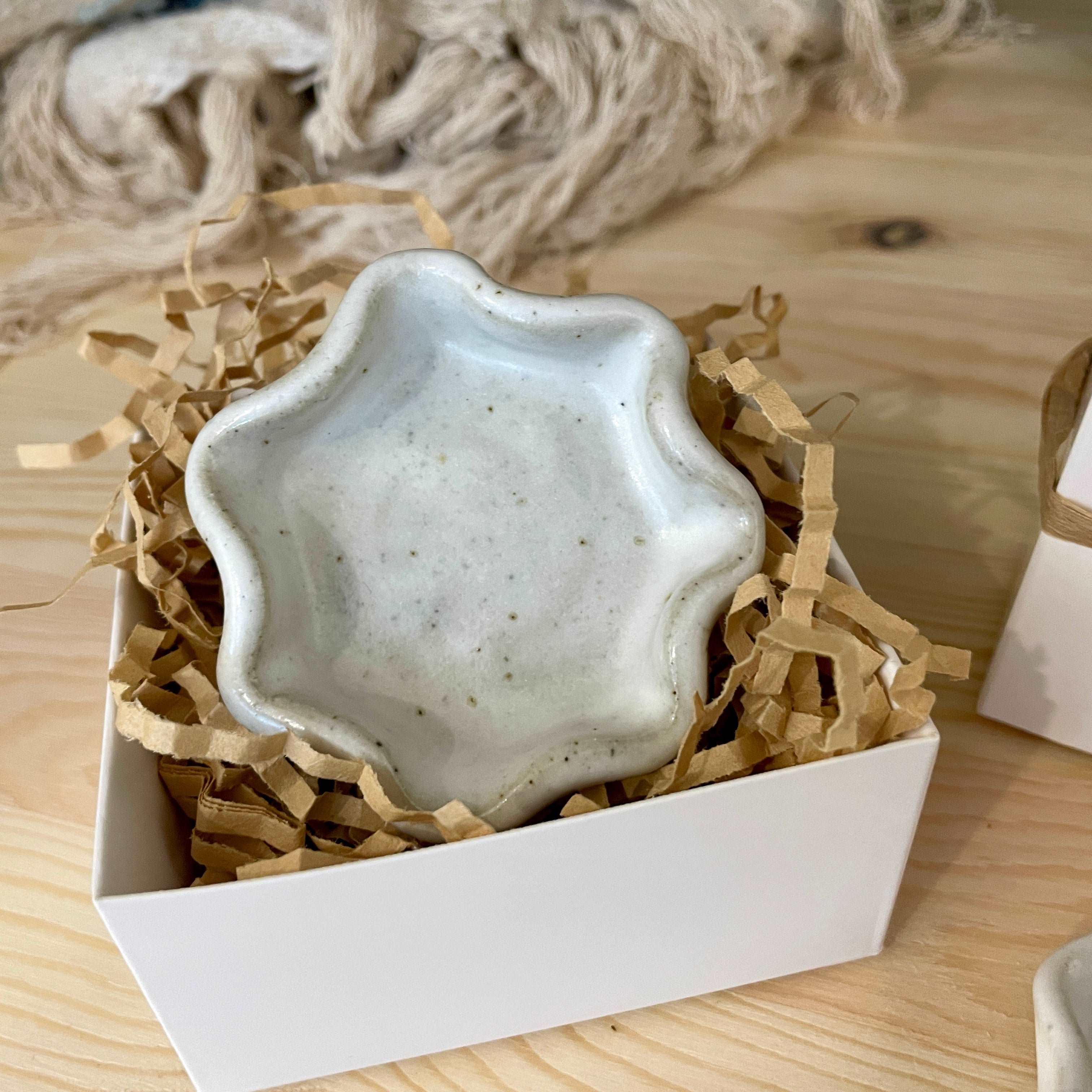 Handcrafted white ceramic ring dish with wave edge — perfect for wedding bands and engagement rings