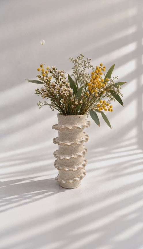 White ceramic petal flower vase