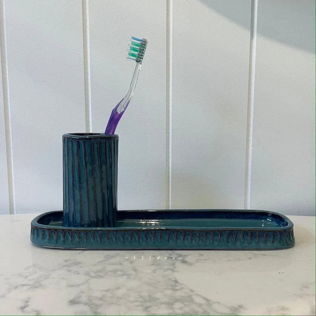 Handcrafted ceramic toothbrush holder in deep turquoise glaze — made to order in Sydney